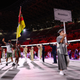 Flag bearers Kevin Loforte of Mozambique and Rady Adosinda Gramane of Mozambique lead their contingent during the athletes' parade at the opening ceremony of the Tokyo Olympics.